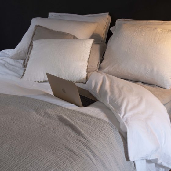 Belle Duvet Cover, with 100% top layer of linen and a bottom layer of satin cotton.